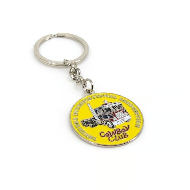 TIA Cowboy Club metal keychain